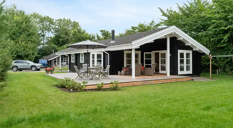 sommerhus med jacuzzi og sauna