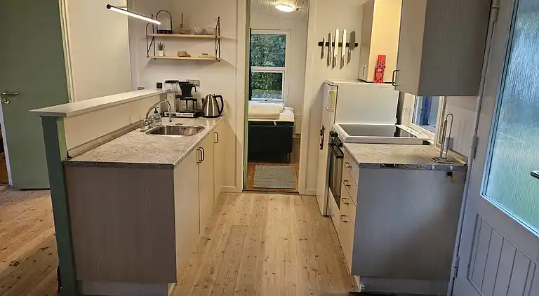 Velkommen til vores charmerende lille sommerhus!
