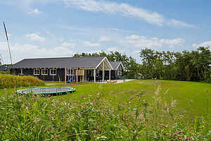 Holiday home for up to 18 people in Blåvand with pool and lo