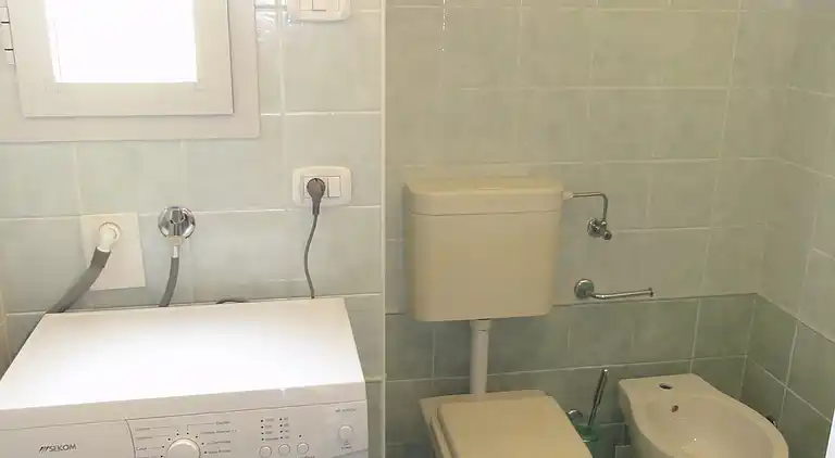 Bibione apartment with pool and solarium access