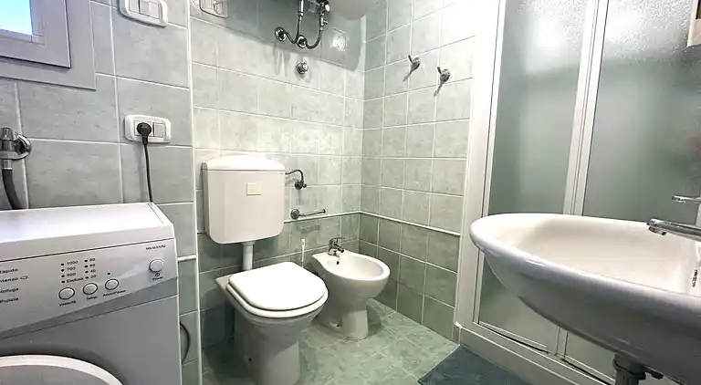 Bibione apartment with pool and solarium access