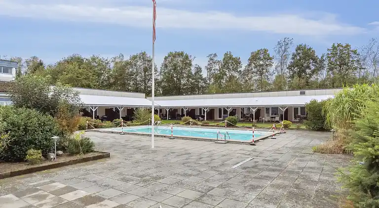 Lys feriebolig nær strand og pool i Dueodde