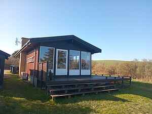 Hyggeligt sommerhus med havudsigt