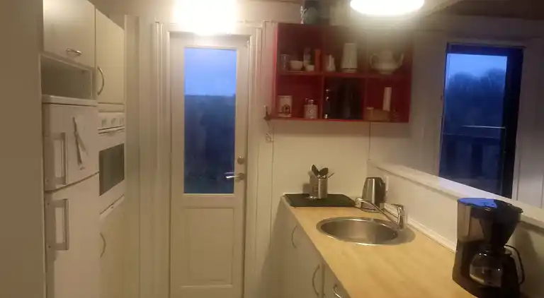 Hyggeligt sommerhus med havudsigt