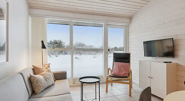 Ferieophold med terrasse ved hav og golf