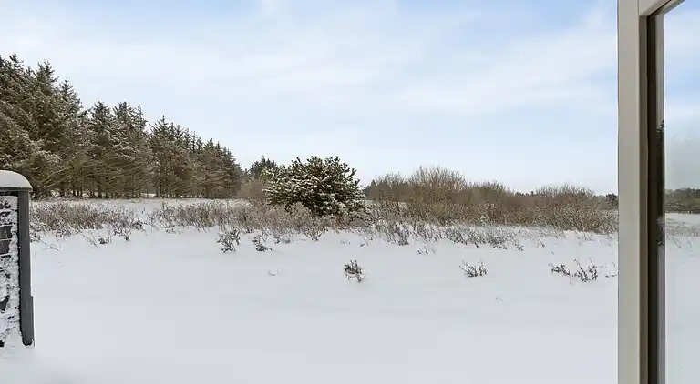Ferieophold med terrasse ved hav og golf