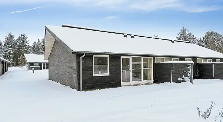 Ferieophold med terrasse ved hav og golf