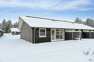 Ferieophold med terrasse ved hav og golf