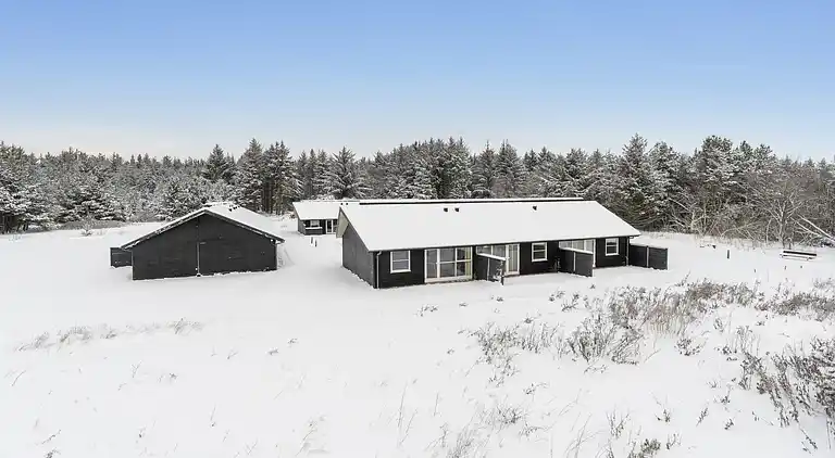 Ferieophold med terrasse ved hav og golf