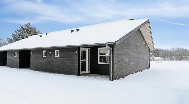 Ferieophold med terrasse ved hav og golf