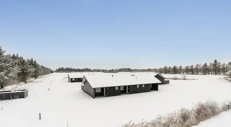 Ferieophold med terrasse ved hav og golf