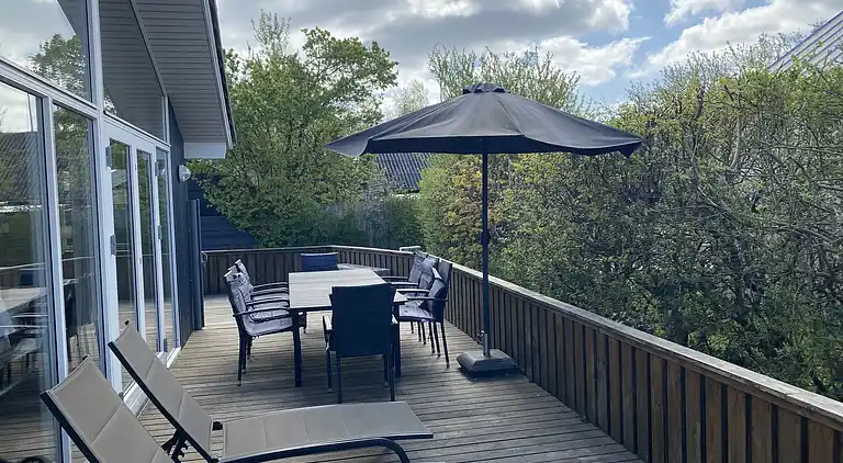 Dejligt familieferiehus kun 130 m fra stranden. 