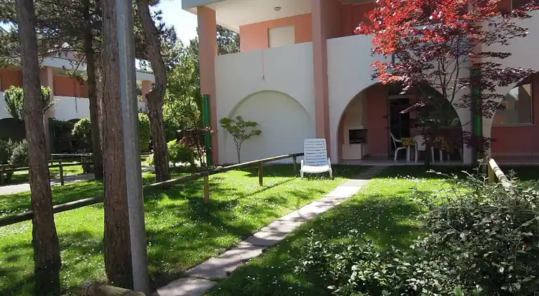 Spacious apartment with terrace and pool in Bibione