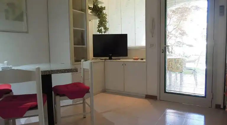 Spacious apartment with terrace and pool in Bibione