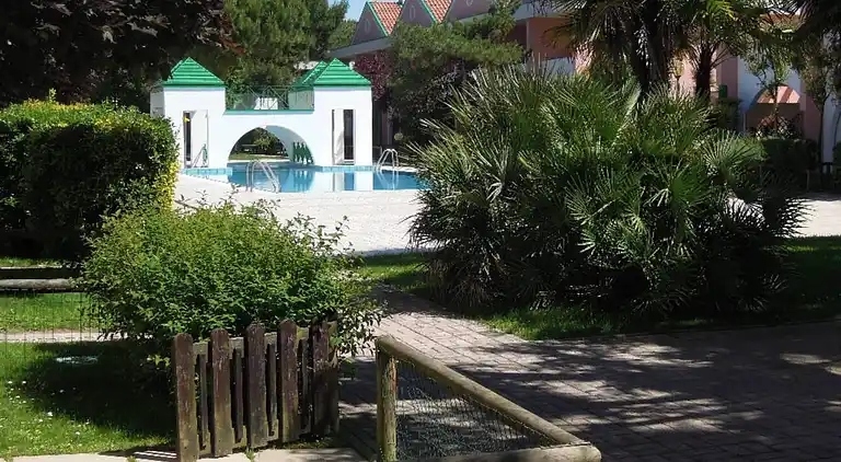 Spacious apartment with terrace and pool in Bibione