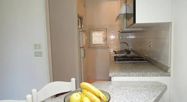 Spacious apartment with terrace and pool in Bibione