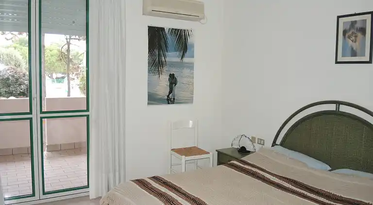 Spacious apartment with terrace and pool in Bibione