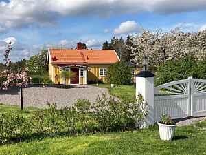 Charmantes Ferienhaus - hat Brücke und Ruderboot