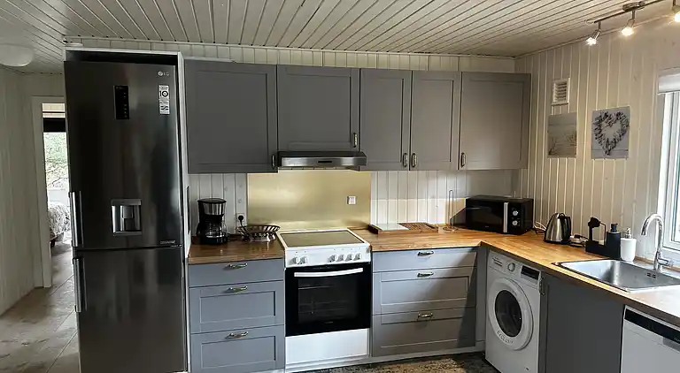 Stijlvol zomerhuis bij strand met groot terras