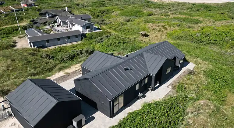 Luxus-Ferienhaus am Strand mit Spa & Spiel