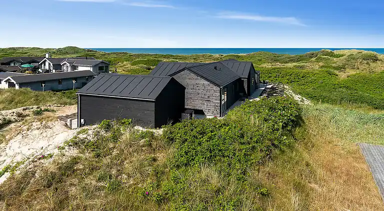 Luxus-Ferienhaus am Strand mit Spa & Spiel