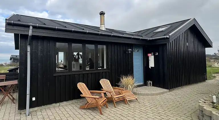 Meerblick und Ladestation für Elektroauto