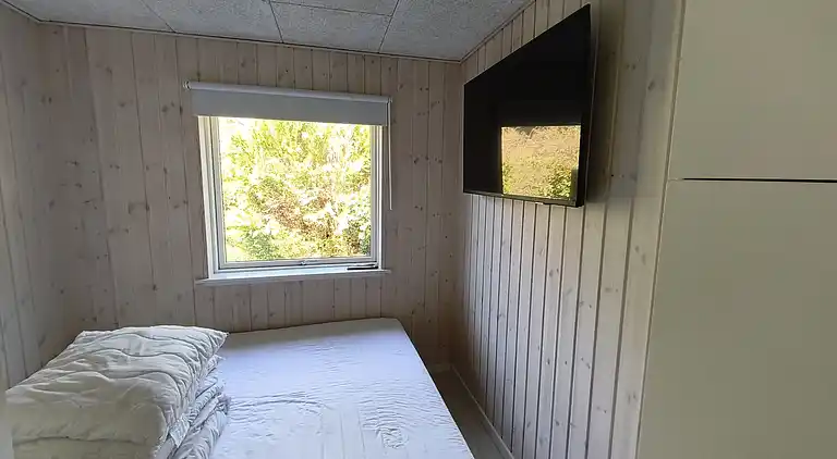 Nyrenoveret sommerhus med vildmarksbad, Marielyst