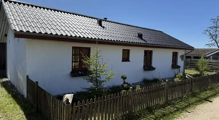 Sommerhus der oser af hygge og komfort. 