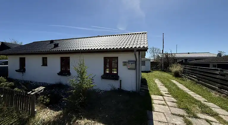 Sommerhus der oser af hygge og komfort. 