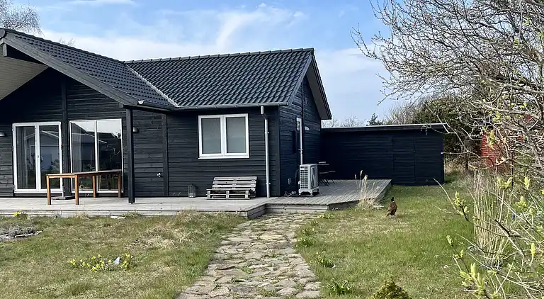 Snug in Snogebæk: A Modern Cozy Summer House 